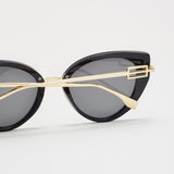 black cateye sunglasses with gold temples