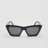 black gunglasses with gold elements cateye look
